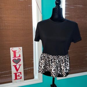 Black top with cheetah print ruffle on bottom